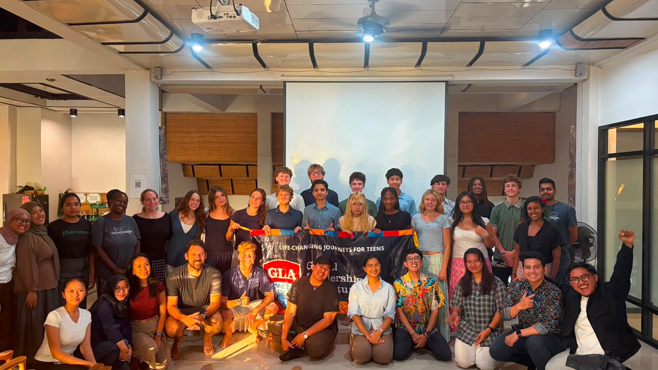 Group photo of Global Leadership Adventures participants with Primakara University and Makadaya Impact Centre representatives